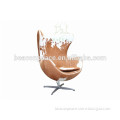 brown and white pony egg chair